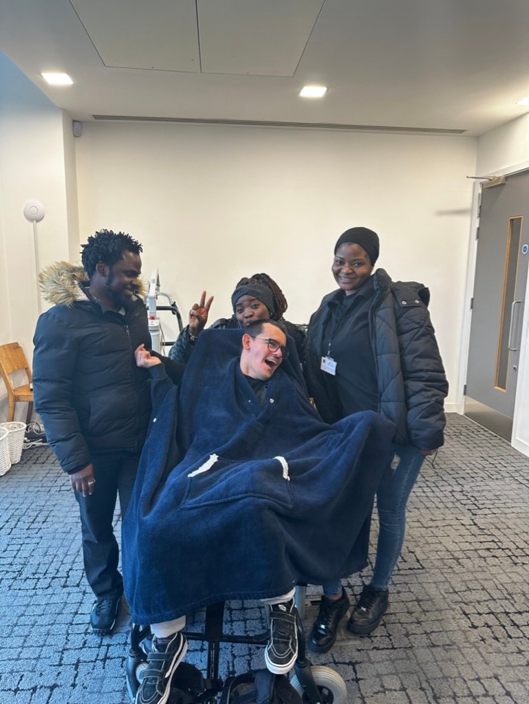 Students and Staff smiling