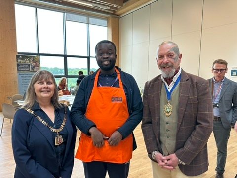 Students celebrating with mayor and local commissioners